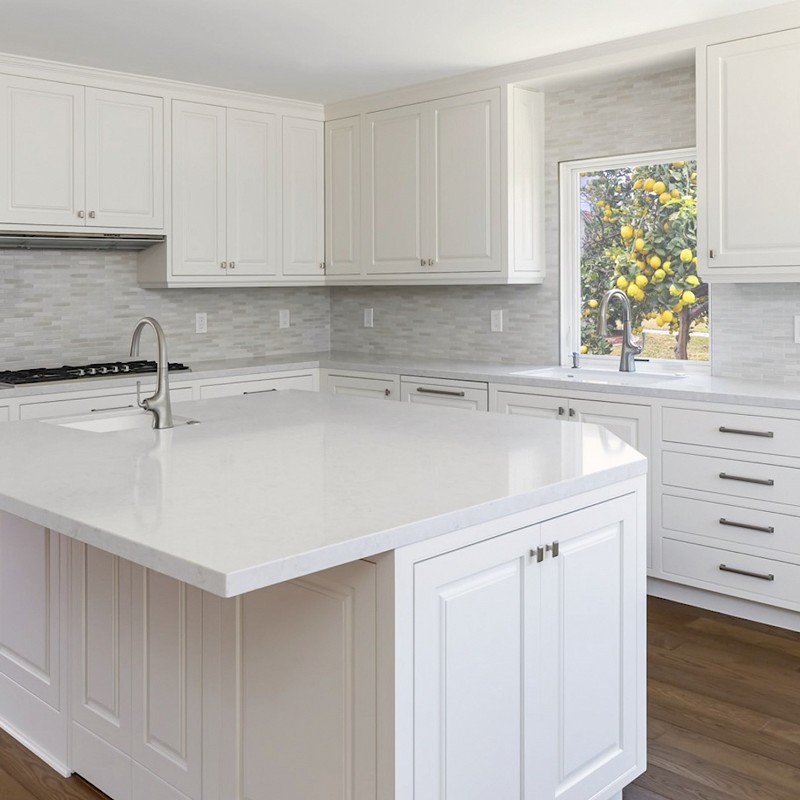 New kitchen with white counters and cabinetry